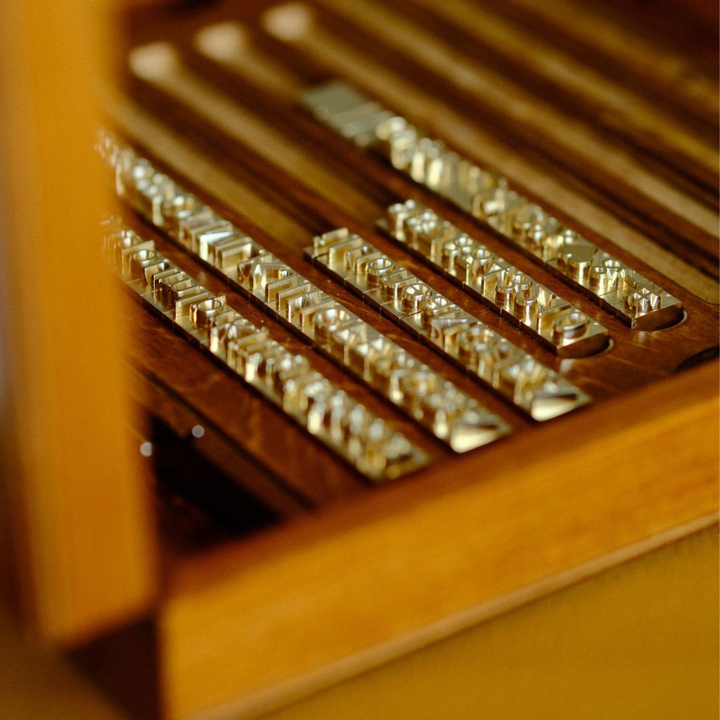 Logo stamps: Go small or go loud? A field guide to Maxita Hot-Foil Letter Set vs Large-Font Brass Set