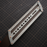 Adjustable leather belt hole positioning ruler with self-centering parallel guides and teardrop punch holes for clean, straight hole marking on belts, straps, bags, watch straps, and pet collars. Lockable, easy to align, and built for consistent leatherwork. Shop now.