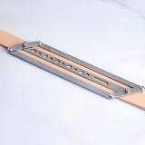 Adjustable leather belt hole positioning ruler with self-centering parallel guides and teardrop punch holes for clean, straight hole marking on belts, straps, bags, watch straps, and pet collars. Lockable, easy to align, and built for consistent leatherwork. Shop now.
