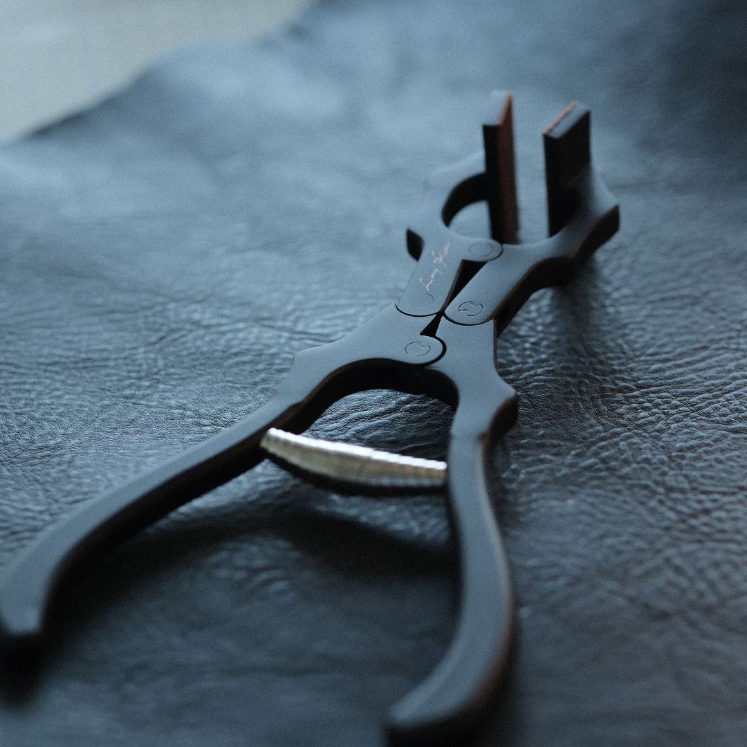 Amy Roke Flat-Jaw Leathercraft Pliers offer precise clamping for hand-stitching and edge work. Made from heat-treated alloy steel for durability and a firm grip. Includes a BIRENA calfskin handle wrap for added comfort. Perfect for leatherworkers. Get yours today!