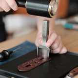 CÍ × bangbang DC53 Leather Belt End Punch, a leathercraft strap end punch for clean, accurate belt tips. Japanese DC53 tool steel, heat-treated for a sharp, durable edge, test-cut before shipping, and built for long-term use. Order yours today.