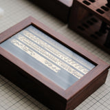 CÍ deluxe brass hot foil stamping type set with walnut storage box, designed for clear leather embossing, custom branding, luggage tags, labels and packaging. Compatible with Maxita Holder No. 1 and MOVEGO machines. Custom fonts available. Shop now.