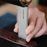 DC53 leather belt slot punch for clean buckle slots, strap holes and oblong cuts. Hand-sharpened, stone-washed and made to order for a steady strike, durable edge and long-term leatherwork use. Shop CÍ × Bangbang.