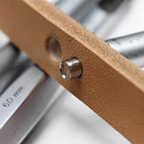 CÍ × bangbang No-Stretch Round Leather Punch for clean, accurate holes in leather. Straight-wall design prevents hole expansion, while the inward-cutting edge reduces distortion. Made from Taiwan high-alloy specialty steel with a hex anti-roll handle. Shop now.