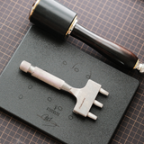 CÍ × Bangbang leather belt slot spacing punch made from DC53 tool steel with a stainless steel handle. Custom spacing available, small-batch made to order, ideal for clean and consistent leather belt, strap and bag strap punching.