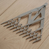 Crafted in collaboration with Nattools, this 3-piece Quick-Mark Divider Set offers precise, even spacing for stitching, punching, and rivet alignment. Made from 301EH stainless steel with locking design, perfect for both beginners and professional leather studios.