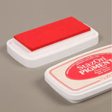 Custom wooden rubber stamp for leather, paper, cardboard, fabric, packaging, tags, and notebook covers. Made from your logo, text, or artwork, with a free Japanese ink pad included. Clean, handmade stamping for branding and packing. Send your design to get started.