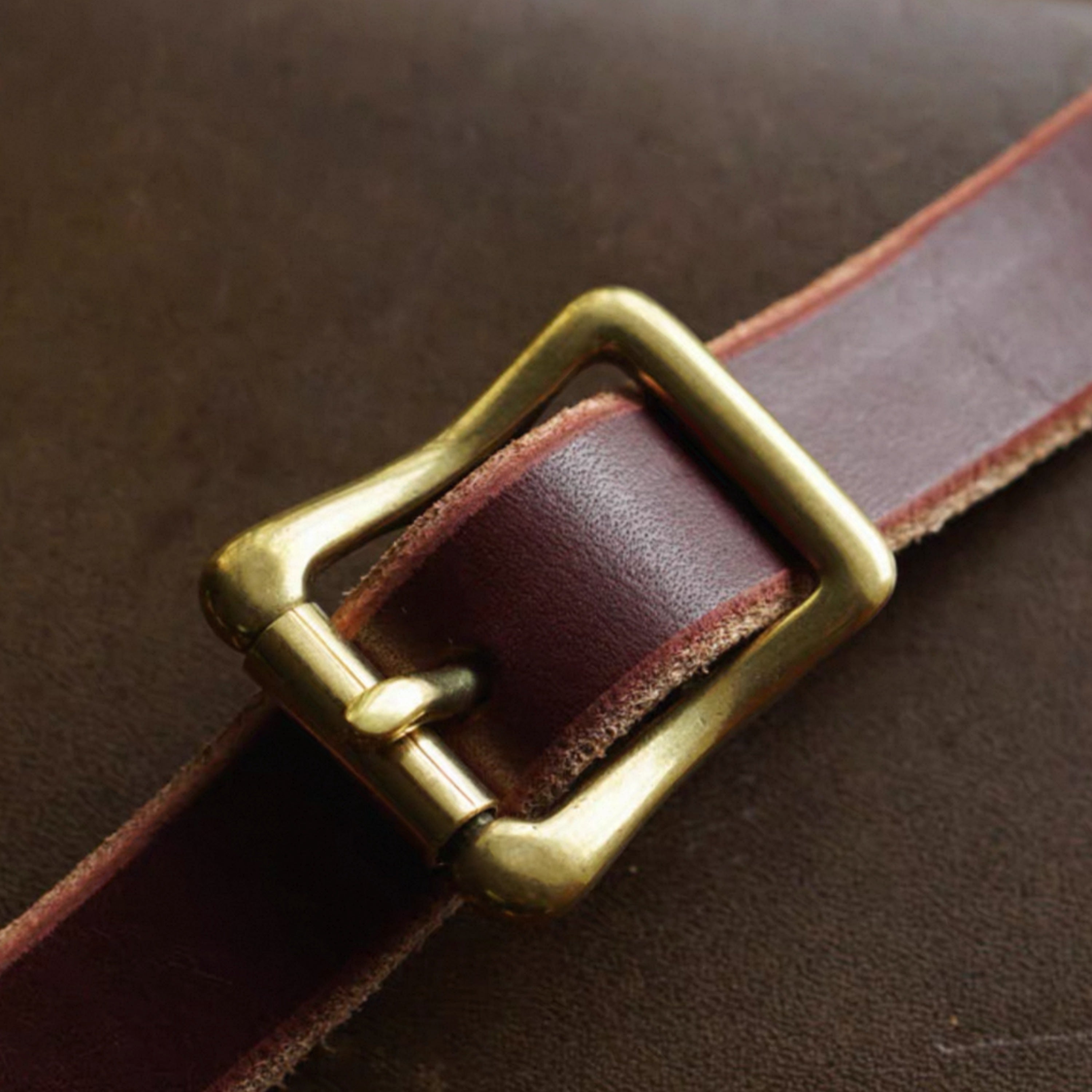 Japanese-made solid brass double-wing strap buckle with an uncoated finish. Designed for a cleaner leather fit and a more refined look in leathercraft projects. Natural brass will develop patina over time. Shop now for timeless leather hardware.