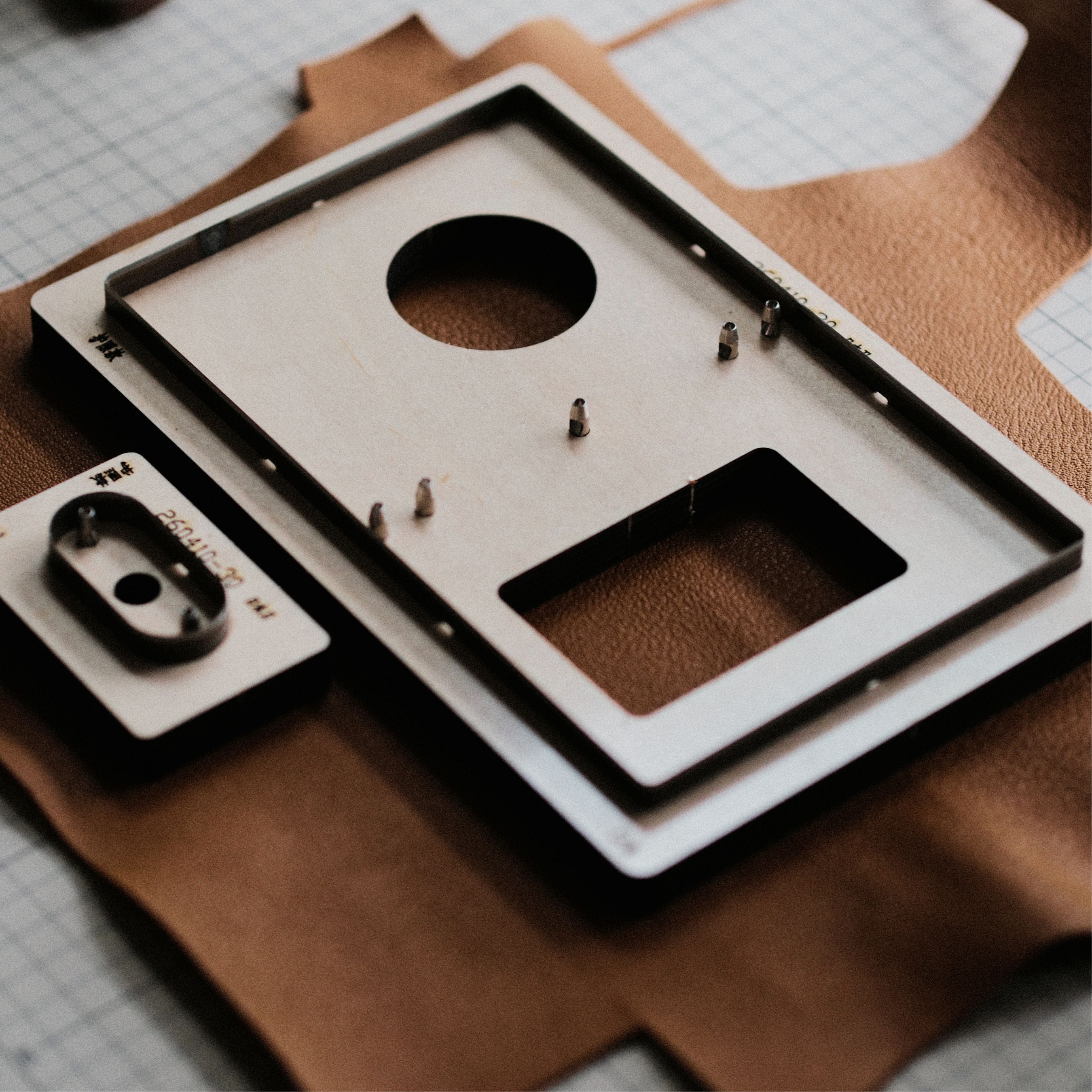 Japanese steel notebook cover die for cutting leather journal, travel notebook, and passport cover shapes cleanly and consistently. Available in standard or custom designs with wood or acrylic base options. Email us to customize yours.