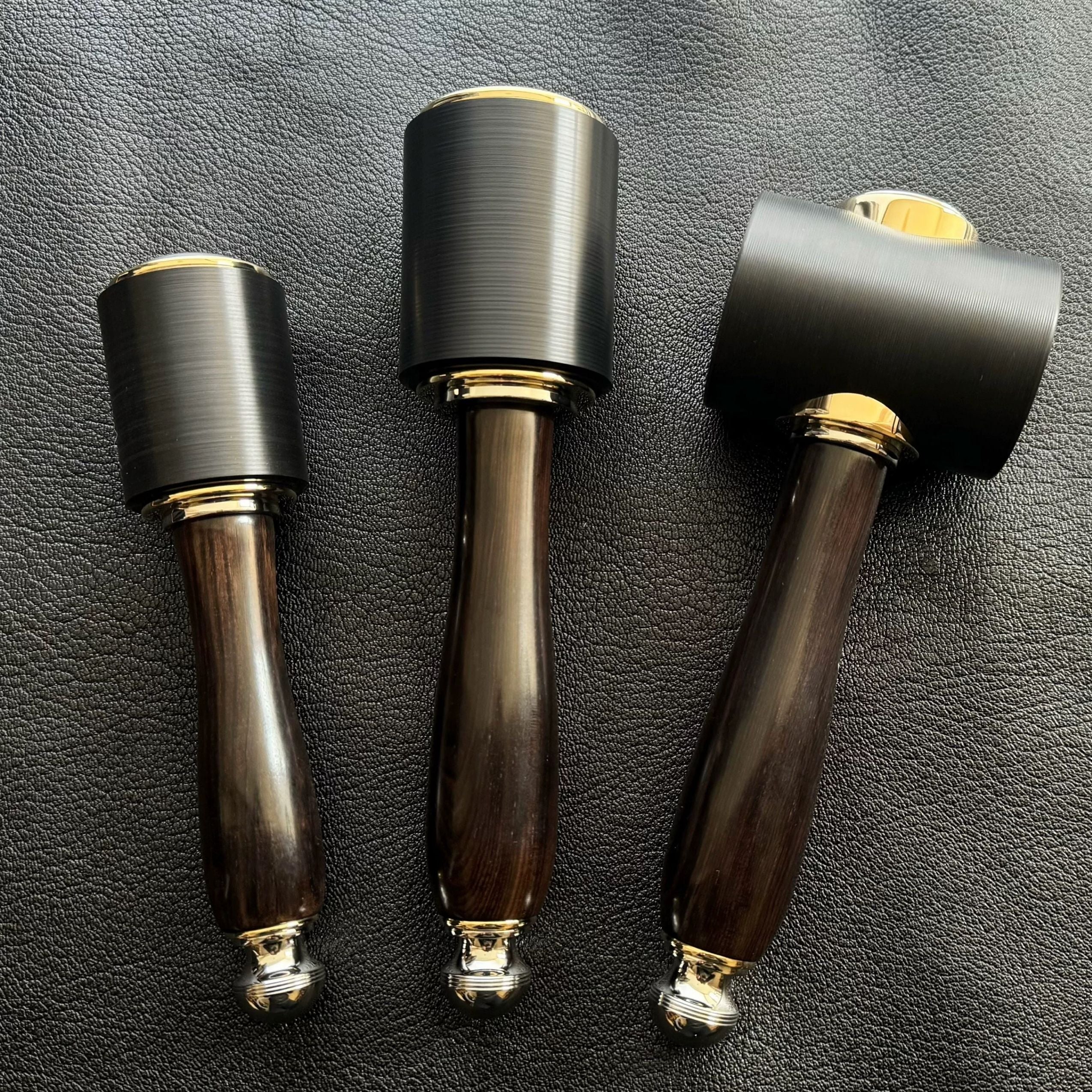 Leathercraft mallet hammer with PP and PA66 nylon head options for punching, carving, die work, and general bench use. Choose from Small PP, Large PA66, or Large T-Shape PA66 styles with a zitan (premium rosewood) handle. Find the right hammer for your workflow.