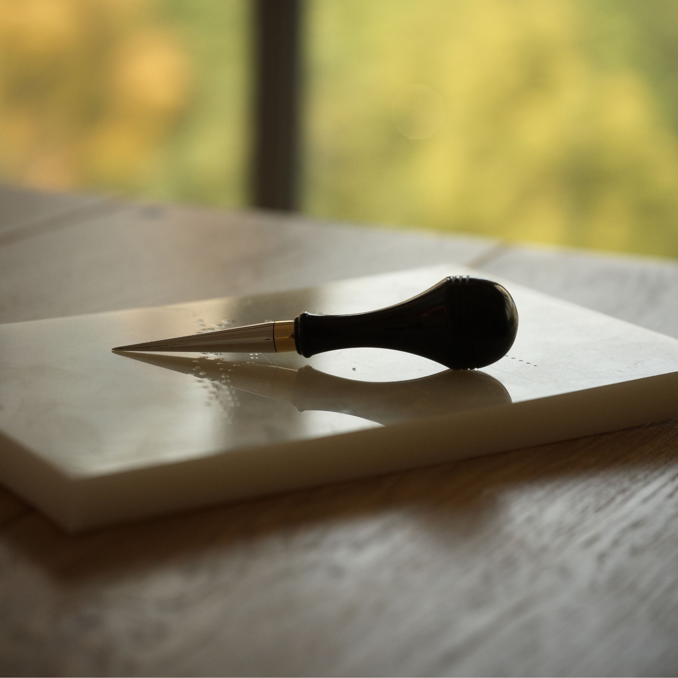 Leathercraft scratch awl for marking lines, opening holes, and widening stitch holes. Made with a solid 304 stainless steel tip and rosewood handle for balanced everyday use in hand stitching and leatherworking. A useful bench tool for daily leathercraft work. Shop now.