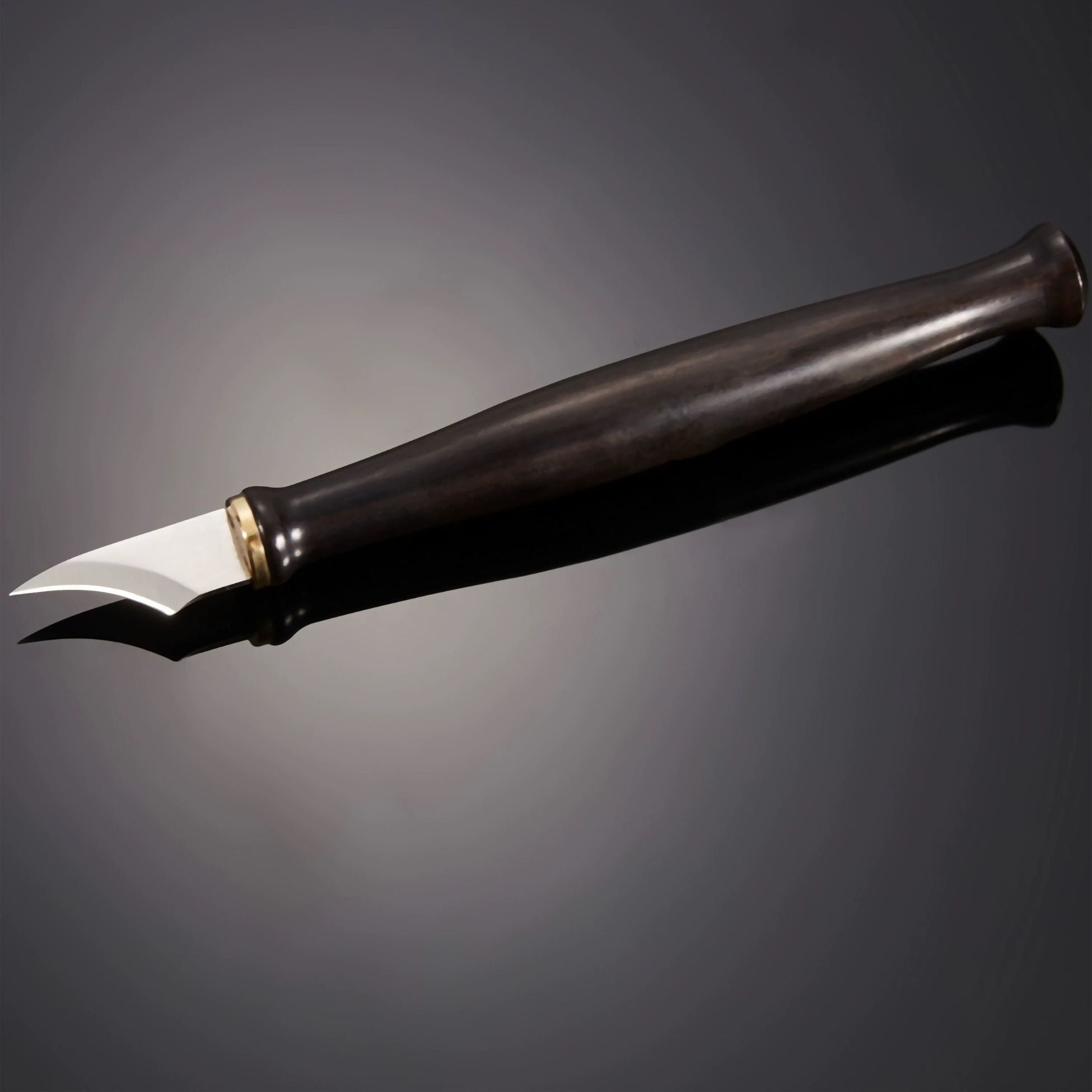 M390 curved leather trimming knife for small radius cuts, hollow work, and precise detail trimming. Made with factory heat-treated powder steel for strong edge retention, wear resistance, and clean control in fine leathercraft work. Explore more here.