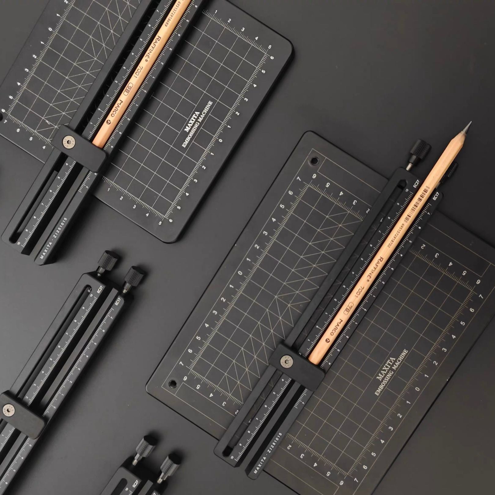 Adjustable pencil holder designed for MAXITA hot foil stamping machines. Made from durable aluminum alloy with clear scale markings for precise alignment. Compatible with EC-17 and EC-27. Ideal for pencil foil stamping. Explore now or contact us to confirm compatibility.
