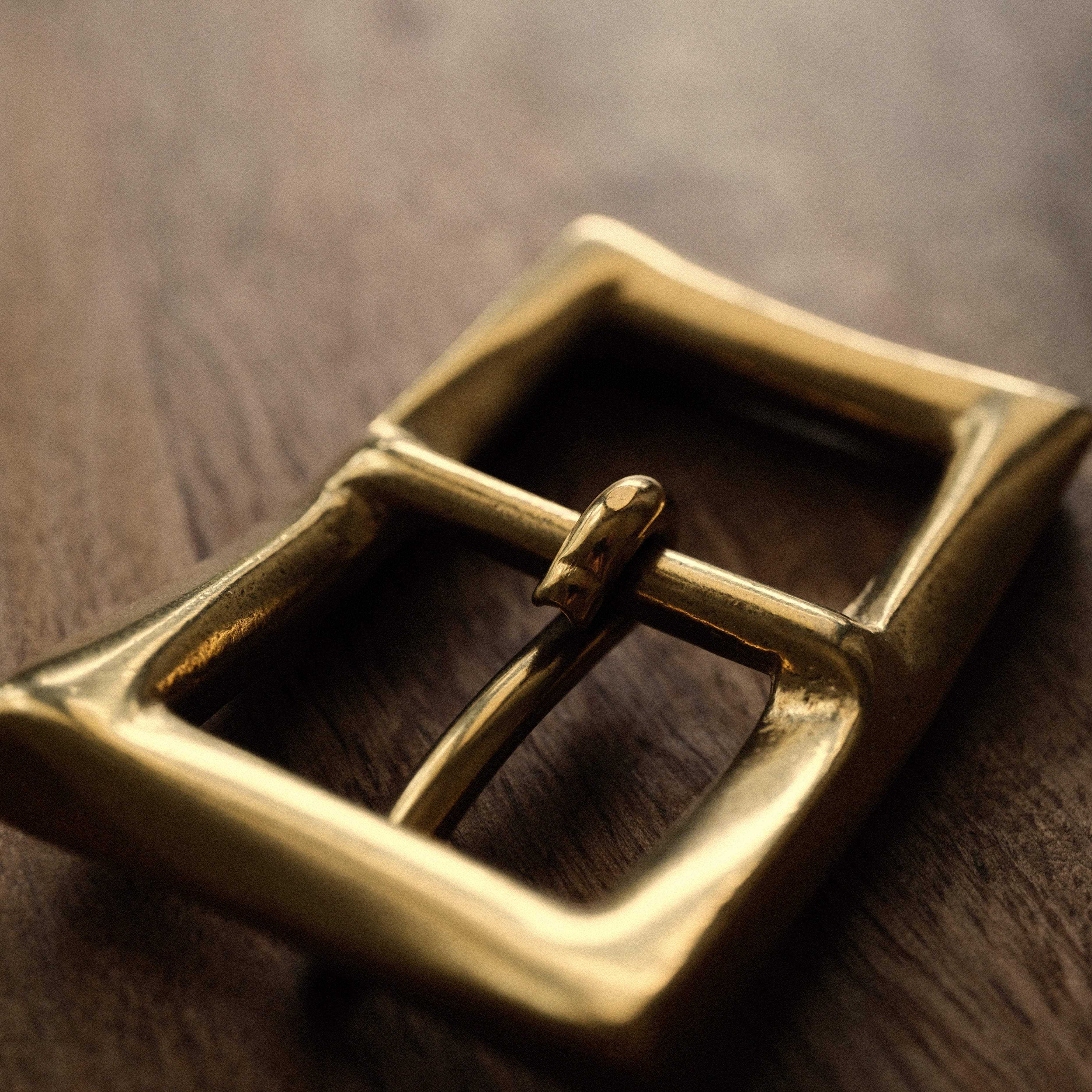 Made in Japan solid brass belt buckle for 25mm leather straps. Sand-cast, naturally aged and supplied with two matching brass screws for handmade belt projects.
