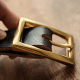 Made in Japan solid brass belt buckle for 25mm leather straps. Sand-cast, naturally aged and supplied with two matching brass screws for handmade belt projects.