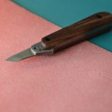 Nattools leather cutting knife features a DC53 steel blade with a vintage washed finish, ensuring sharp, precise cuts.