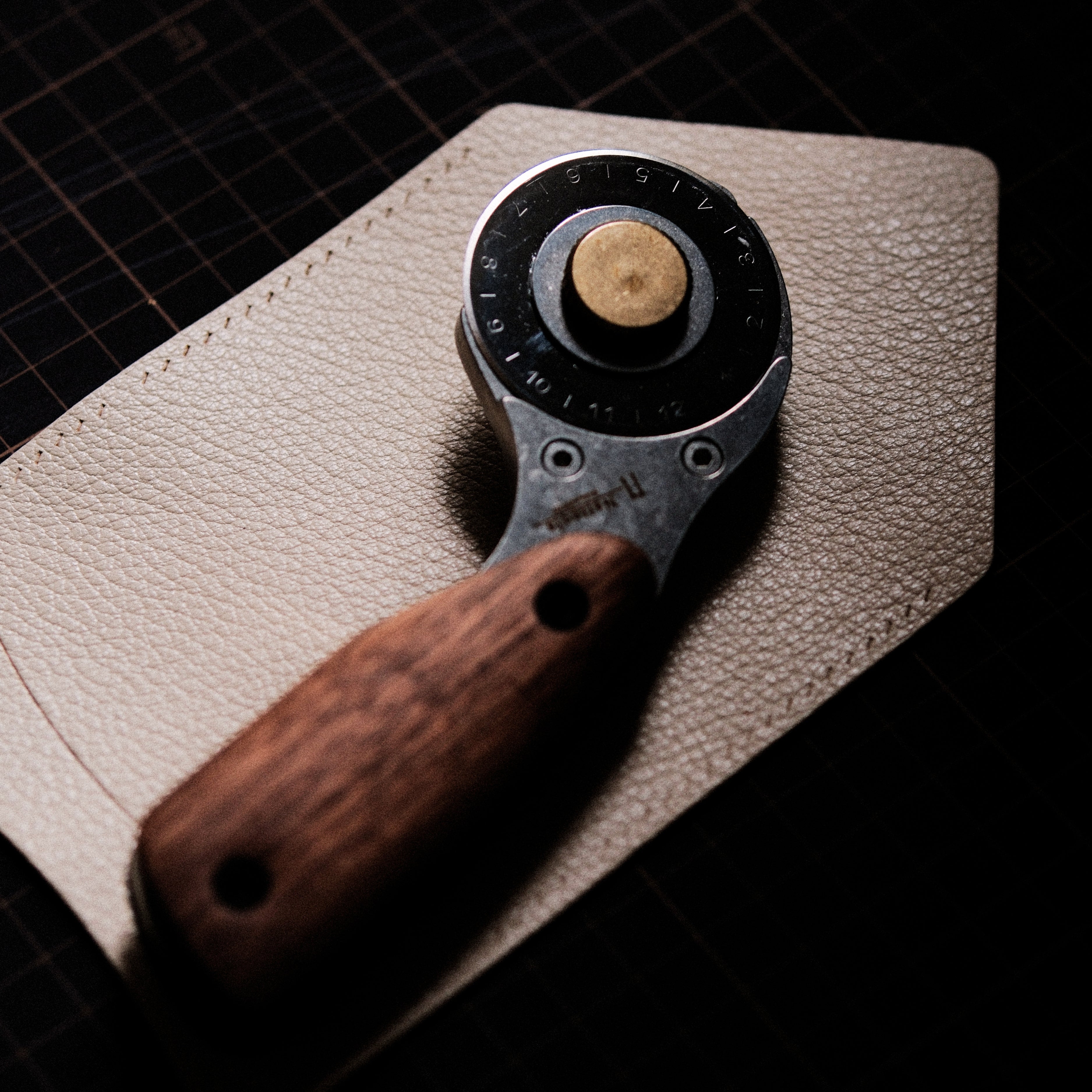 The Nattools Safety Rotary Leather Cutter is a compact, easy-to-control leather cutting tool with a retractable rotary blade, replaceable blade system, stainless steel body, and comfortable wooden handle. It is designed for smooth, safer, and less tiring cutting when working on leather straps, bag handles, panels, and pattern edges.