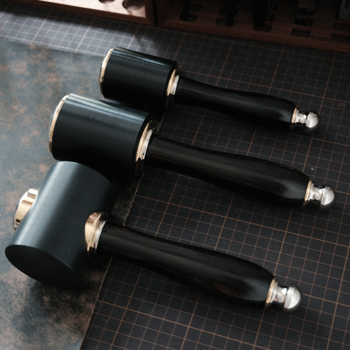 All three are made with a zitan (premium rosewood) handle, along with stainless steel and brass details, giving them a solid, comfortable feel in hand. Since the handle is made from natural wood, each piece will have its own grain pattern.