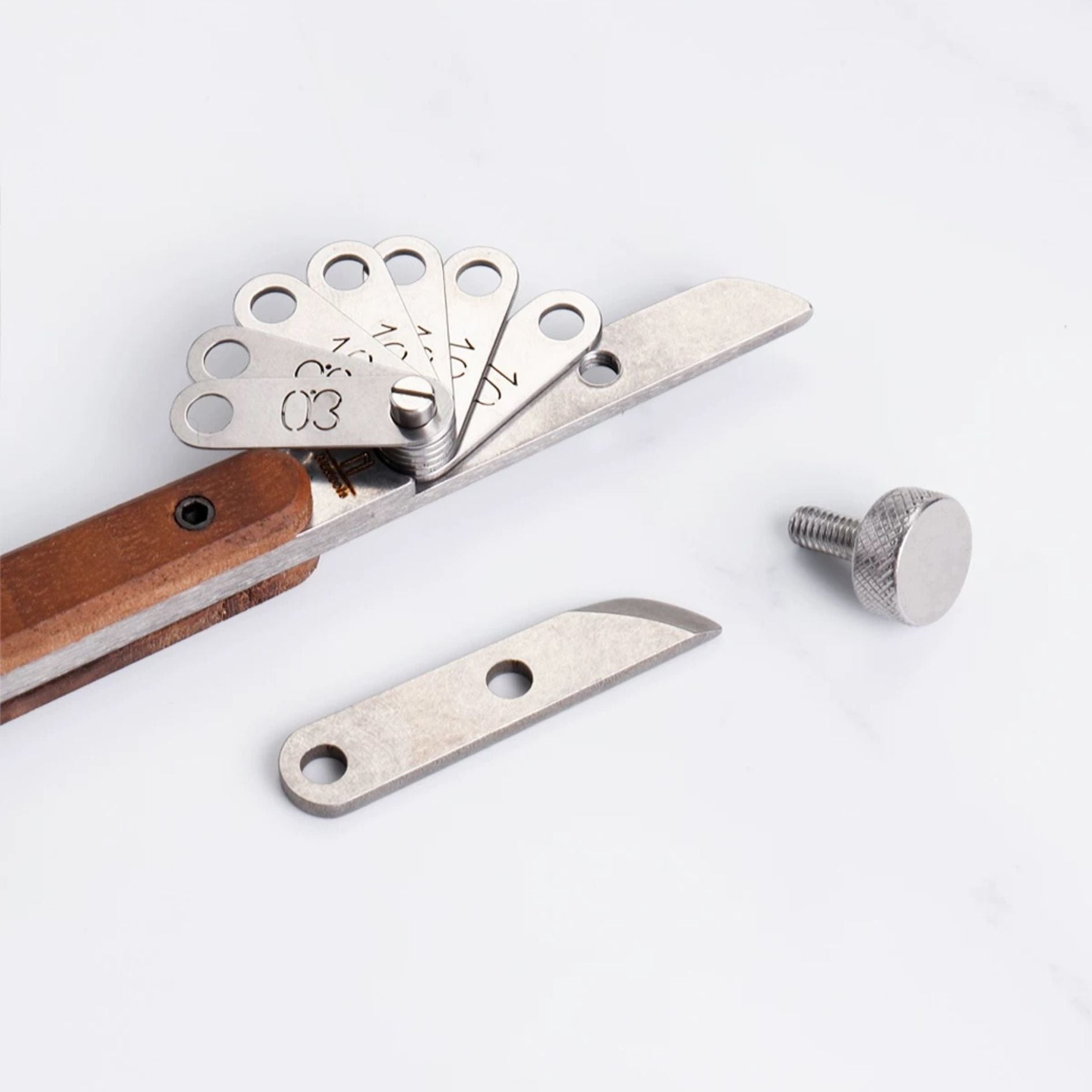Adjustable leather edge creaser for clean, consistent stitch-line marks. Shim-based spacing lets you dial in perfect lines for belts, wallets and straps. 304 stainless body, stone-washed finish, walnut handle for comfort and control. Get steadier edges—shop now.