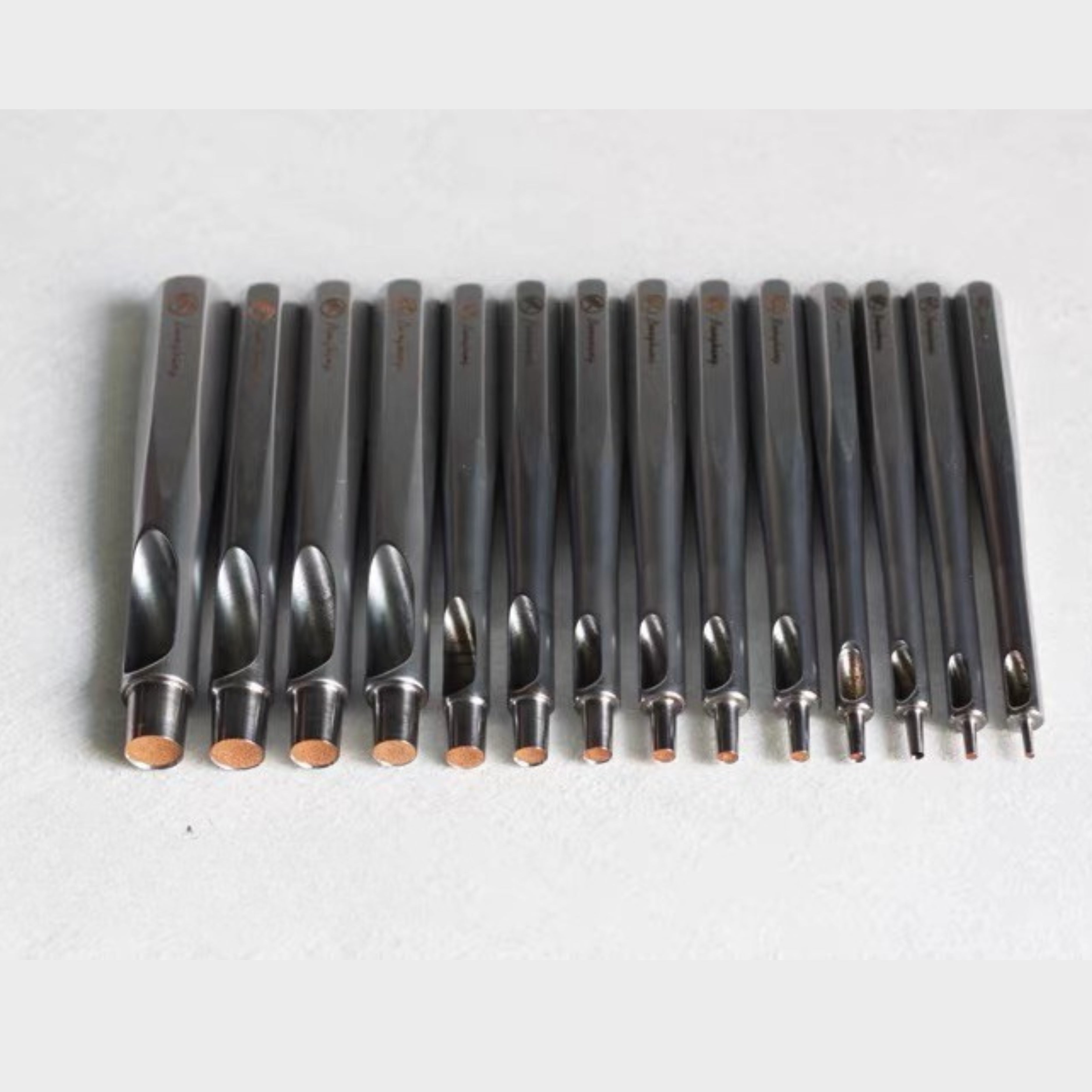 It is made from Taiwan-made high-alloy specialty steel, chosen for edge stability, toughness, and long-term use. Unlike many standard round punches with a tapered body, this punch uses a straight-wall, no-stretch design. The cutting shape goes straight down without expanding the hole, so the finished hole stays closer to the actual punch size.