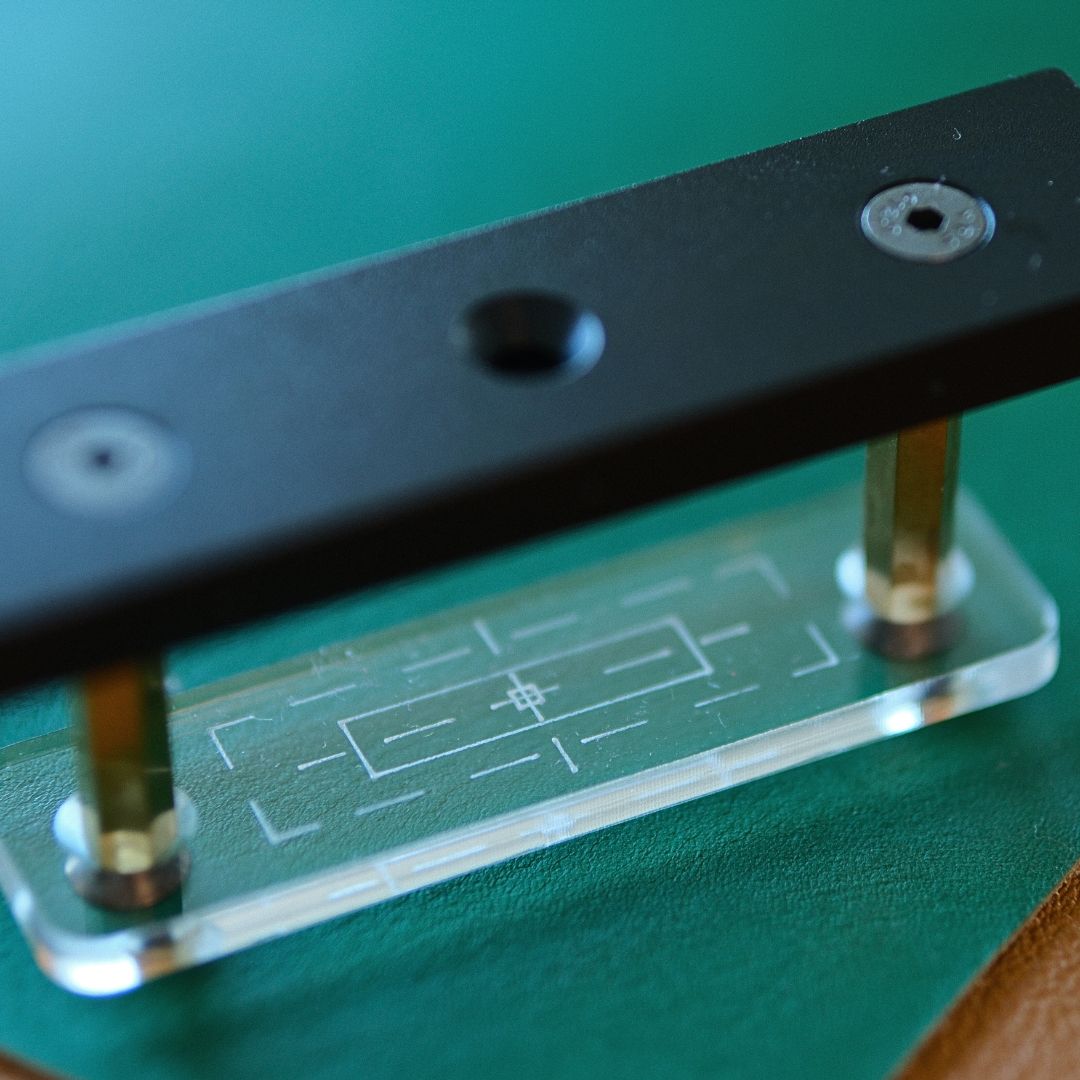 The Maxita Transparent Acrylic Positioning Holder is the perfect alignment tool for crafters using the Type 2 holder on the Maxita Foil Stamping Machine. It's designed to provide precise positioning when working with thicker materials, where infrared alignment might not perform as effectively due to material thickness or edge curvature. This transparent holder offers a clear and stable solution for accurate stamping setups, but it’s important to note that it doesn’t heat. After positioning, simply clamp you