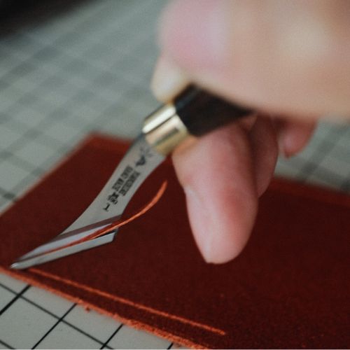 Craft clean, smooth grooves with the Yorkshine Leather Groover. Made with cryo-treated DC53 steel and a walnut handle, it's sharp, comfortable, and built to last. Ideal for precise leatherwork. Shop now for pro-level results.