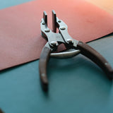 Flat nose pliers designed to maintain parallelism at any angle.