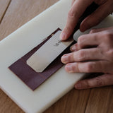 12C27 round head leather skiving knife for thinning, paring, raised work, and edge shaping. Easy to strop, rust-resistant, sharp, and stable in hand for cleaner leather skiving on vegetable-tanned leather. Shop now.