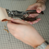 The 2nd Generation Nattools Leather Flat Pliers, an essential tool crafted for leathercraft enthusiasts and professionals seeking precision and dura
