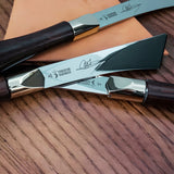2026 upgraded Japanese long blade skiving knife with Böhler N690 stainless steel, flat-ground back, tapered blade body, walnut handle, and low-angle cutting control for clean leather skiving, thinning, and detail work. Shop now.