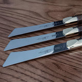 2026 upgraded Japanese long blade skiving knife with Böhler N690 stainless steel, flat-ground back, tapered blade body, walnut handle, and low-angle cutting control for clean leather skiving, thinning, and detail work. Shop now.
