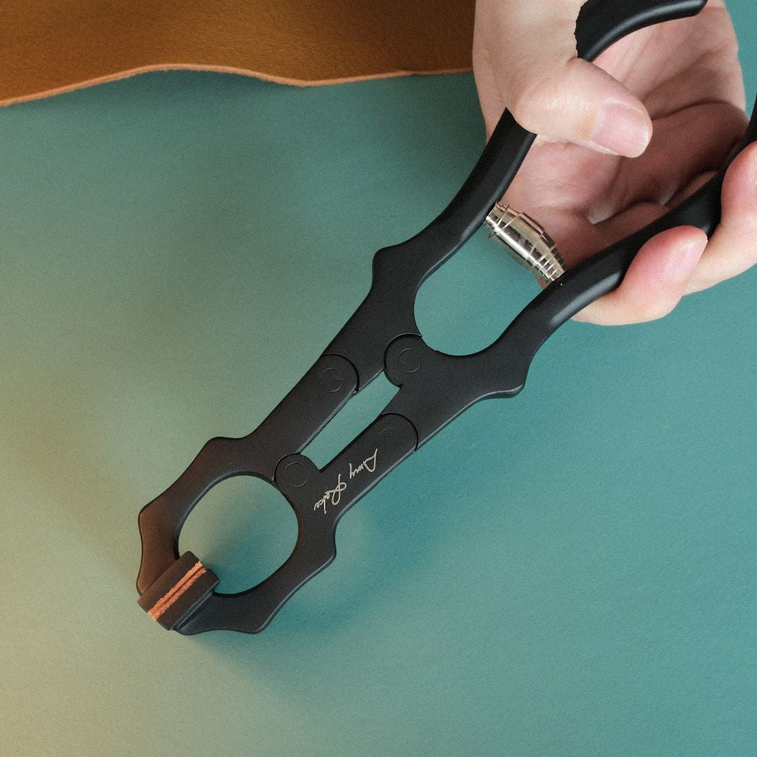 Amy Roke Flat-Jaw Leathercraft Pliers offer precise clamping for hand-stitching and edge work. Made from heat-treated alloy steel for durability and a firm grip. Includes a BIRENA calfskin handle wrap for added comfort. Perfect for leatherworkers. Get yours today!