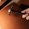 The handle is crafted from purpleheart wood, not just for its rich color, but for its strength and dense, smooth texture. It feels great in the hand, especially during longer crafting sessions. The balance is spot-on, making each strike clean and controlled — perfect for precise stitching or tapping work.