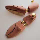 Keep your leather shoes in shape with natural cedar shoe trees. Featuring an adjustable split toe, twin-tube spring support and a convenient heel knob, they help reduce creasing, absorb excess moisture and maintain your shoes' original shape. Explore quality shoe care essentials at CÍ OFFICIAL.