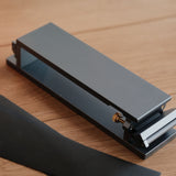 Aluminum sandpaper sharpening base for leathercraft knives and edge tools. CNC-machined with an anodized finish, non-slip silicone backing, and a flat clamping design for easier, more consistent sharpening. Includes 600, 1200, and 2000 grit sandpaper. Shop now.