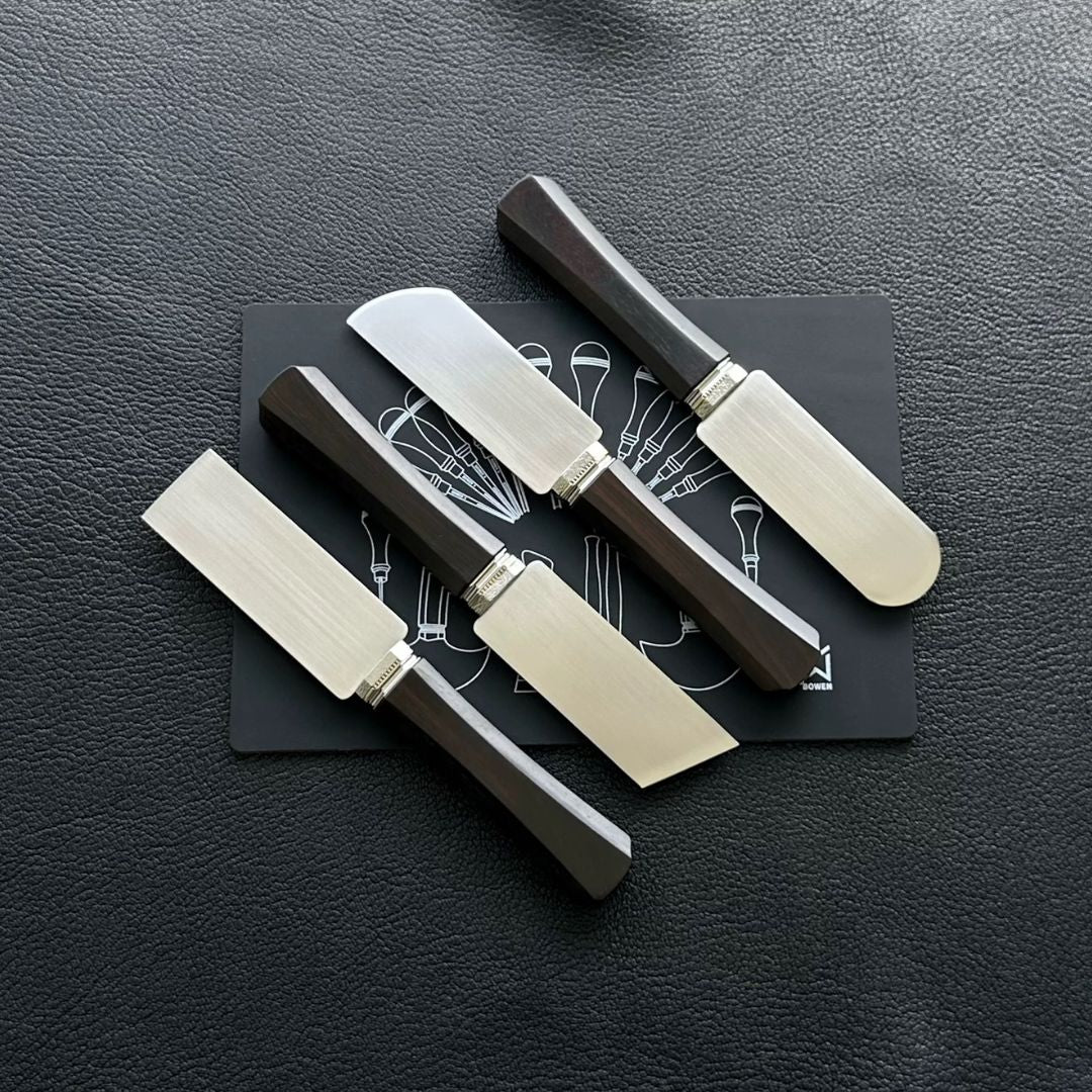 Experience precision with the BOWEN M390 Leathercraft Knife. Made from high-performance M390 steel for superior edge retention, corrosion resistance, and durability. Perfect for fine cutting, beveling, and detailed grooving. With an ergonomic purple sandalwood handle and refined steel guard, it's a must-have for serious leatherworkers. Order now!