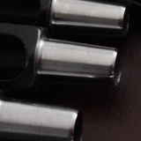 Taiwan-made Bangbang hex round punch set for leathercraft. High-toughness special alloy steel punches with black finish and wooden base, ideal for clean belt holes, hardware holes, and round leather punching.