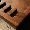 Keep your pricking irons and punches organized with this 11-slot black walnut tool box. Fits most common brands, protects tools from dust, and adds a clean look to your workbench. A solid storage upgrade for leathercrafters—grab yours now.