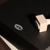 Custom wooden rubber stamp for leather, paper, cardboard, fabric, packaging, tags, and notebook covers. Made from your logo, text, or artwork, with a free Japanese ink pad included. Clean, handmade stamping for branding and packing. Send your design to get started.