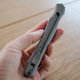 Designed for those who value balance, precision, and timeless craftsmanship, the&nbsp;Retro Stainless Steel Craft Knife combines solid performance with a refined, minimalist look. Its curved body fits naturally in the hand, staying stable and comfortable even during long use. Perfect for leathercraft, paper modeling, or any detailed cutting work that requires control and accuracy.Available in two finishes — Stonewashed Black and Dark Gray Sandblasted — each with its own unique texture and character.