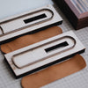 Custom leather pen sleeve cutting die with Japanese steel blade, wooden base, and built-in stitching holes. Made for clean cutting, accurate hole placement, and custom leather pen case production.