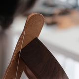 Custom leather pen sleeve cutting die with Japanese steel blade, wooden base, and built-in stitching holes. Made for clean cutting, accurate hole placement, and custom leather pen case production.
