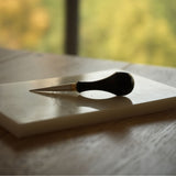 Leathercraft scratch awl for marking lines, opening holes, and widening stitch holes. Made with a solid 304 stainless steel tip and rosewood handle for balanced everyday use in hand stitching and leatherworking. A useful bench tool for daily leathercraft work. Shop now.