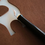 M390 curved leather trimming knife for small radius cuts, hollow work, and precise detail trimming. Made with factory heat-treated powder steel for strong edge retention, wear resistance, and clean control in fine leathercraft work. Explore more here.