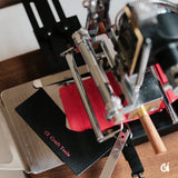 MOVEGO vintage hot foil stamping machine for leather, paper and PVC. Compact, tactile and easy to align, with clamp, infrared guide and worktable included. Custom stamping support, professional setup advice and reliable after-sales service from CÍ. Shop now.