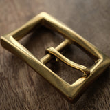 Made in Japan solid brass belt buckle for 25mm leather straps. Sand-cast, naturally aged and supplied with two matching brass screws for handmade belt projects.