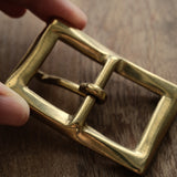 Made in Japan solid brass belt buckle for 25mm leather straps. Sand-cast, naturally aged and supplied with two matching brass screws for handmade belt projects.