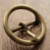 Made in Japan from solid brass, this round leather buckle has a sand-cast, tumble-finished surface that develops a natural patina over time. A practical choice for handmade belts, bags and vintage-style leathercraft. Shop Japanese brass hardware at CÍ.