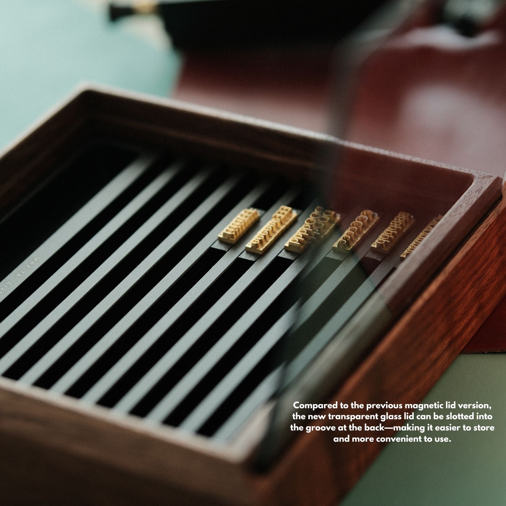 Modular walnut stamp box for Maxita brass letters. Freely arrange letters with movable modules that stay in place. Upgraded with a stable layout and glass lid for dust-free storage and display. A clean, flexible way to organize your type. Explore now.