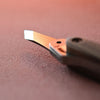 Nattools leather cutting knife features a DC53 steel blade with a vintage washed finish, ensuring sharp, precise cuts.